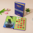 The 72 Colour Eyeshadow Palette Book Blue Edition –  Matte, Shimmer & Wet Powder Makeup Set featuring colourful shades with decorative blue packaging on a beige surface.