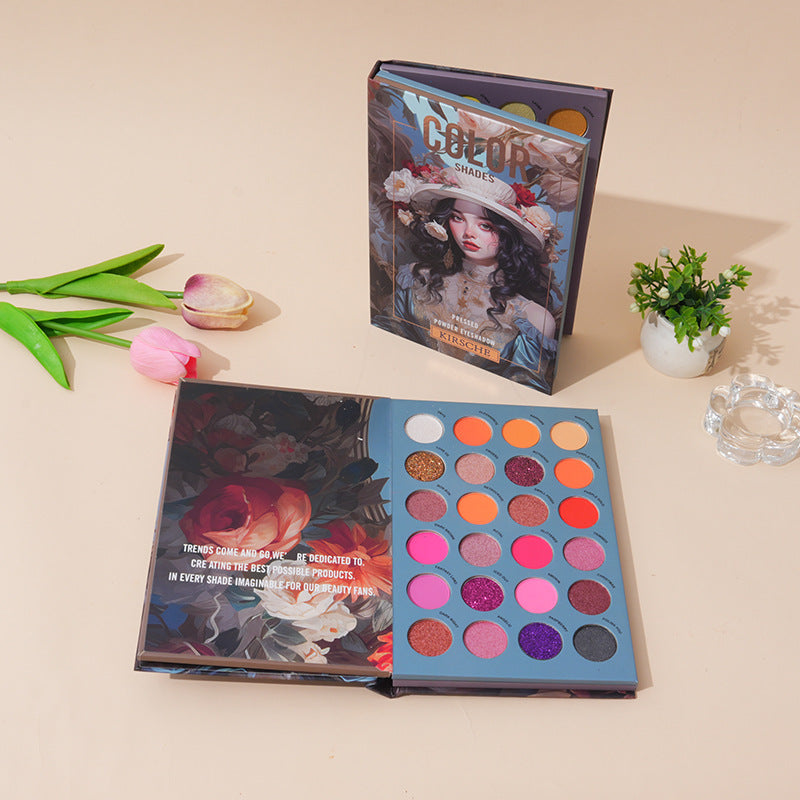 The 72 Colour Eyeshadow Palette Book Multicolour Edition –  Matte, Shimmer & Wet Powder Makeup Set featuring colourful shades with decorative packaging on a beige surface.