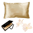 The Ardor Mulberry Silk Standard Pillowcase Golden Princess displayed alongside its packaging and a decorative flower, suggesting a luxurious and elegant product intended for comfort and style in bedroom decor.