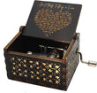 “Can’t Help Falling in Love” Wooden Music Box – Romantic Anniversary Keepsake Gift for Couples, with decorative carvings and a hand crank, featuring a black lid with gold text.