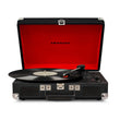 Crosley Cruiser Black - Bluetooth Portable Turntable with a red interior, showing a record on the turntable and the brand name 'Crosley' visible on the top.