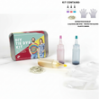 The DIY Tie Dye Kit for T-Shirts – Kids & Family Fabric Dye Set with 3 Inks, Gloves & Elastic Bands featuring dye bottles, a tin, and materials on a white background.