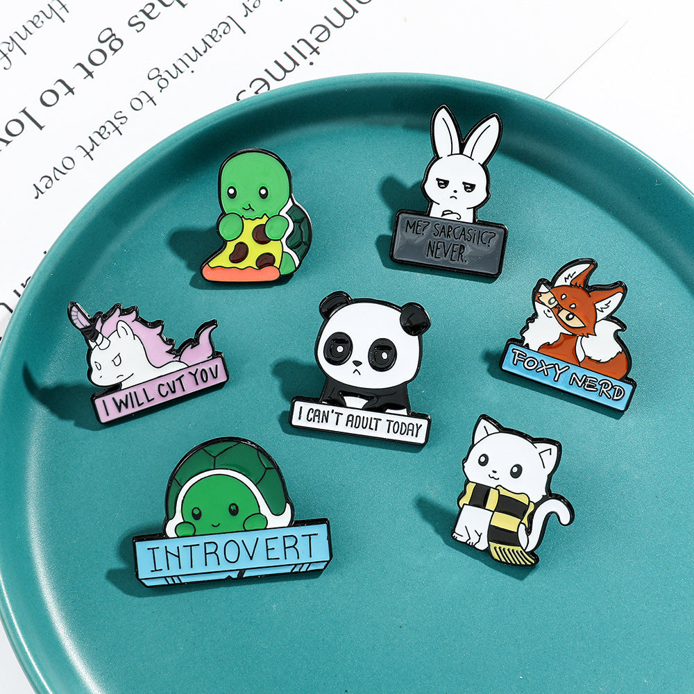 Funny Animal Enamel Pin Set 6 Pack – Cute Cartoon Lapel Pins for Bags, Jackets & Accessories featuring a collection of cartoon-themed pins such as turtles, a fox, and rabbit on a teal surface