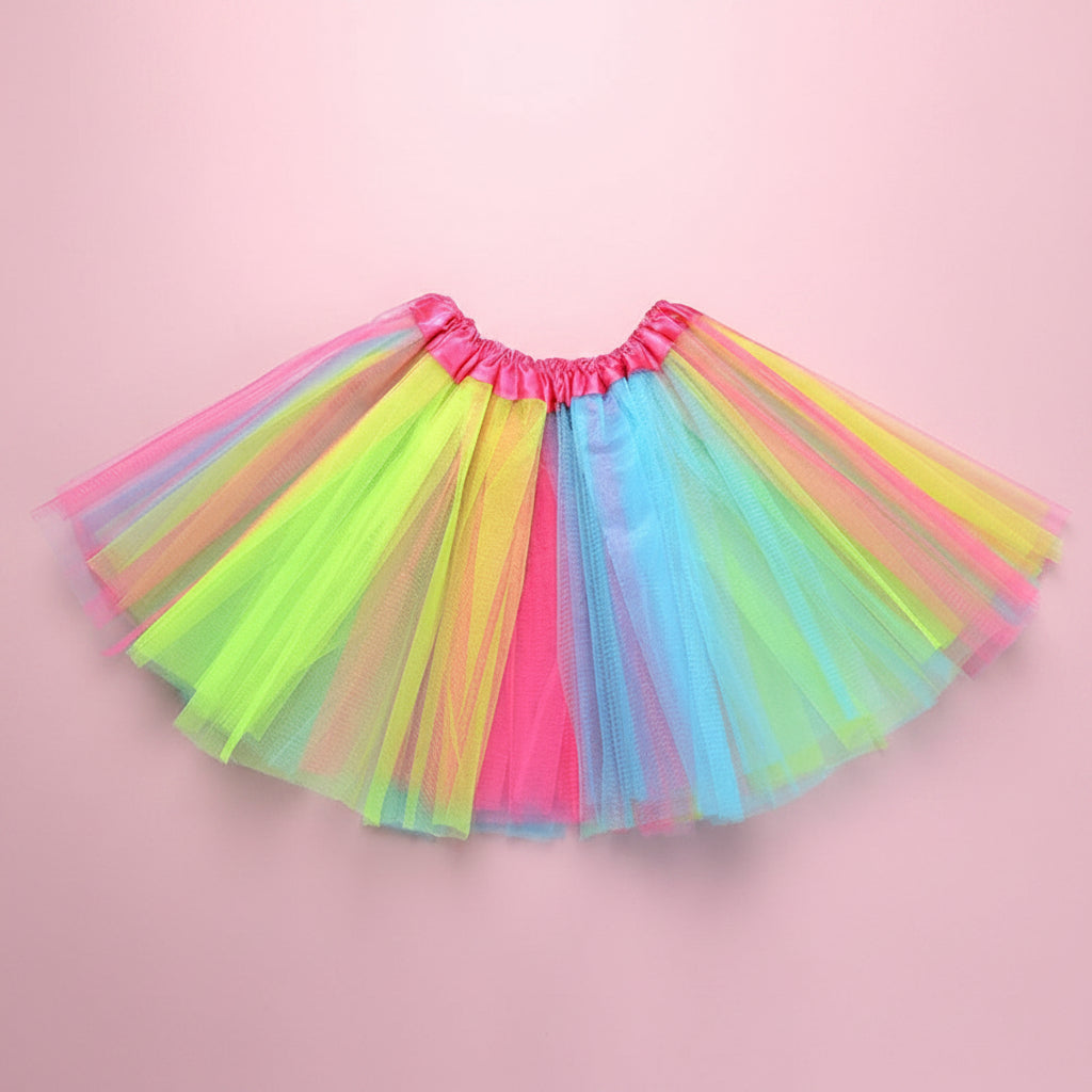 Colourful tutu skirt with pink elastic waistband on a baby pink background