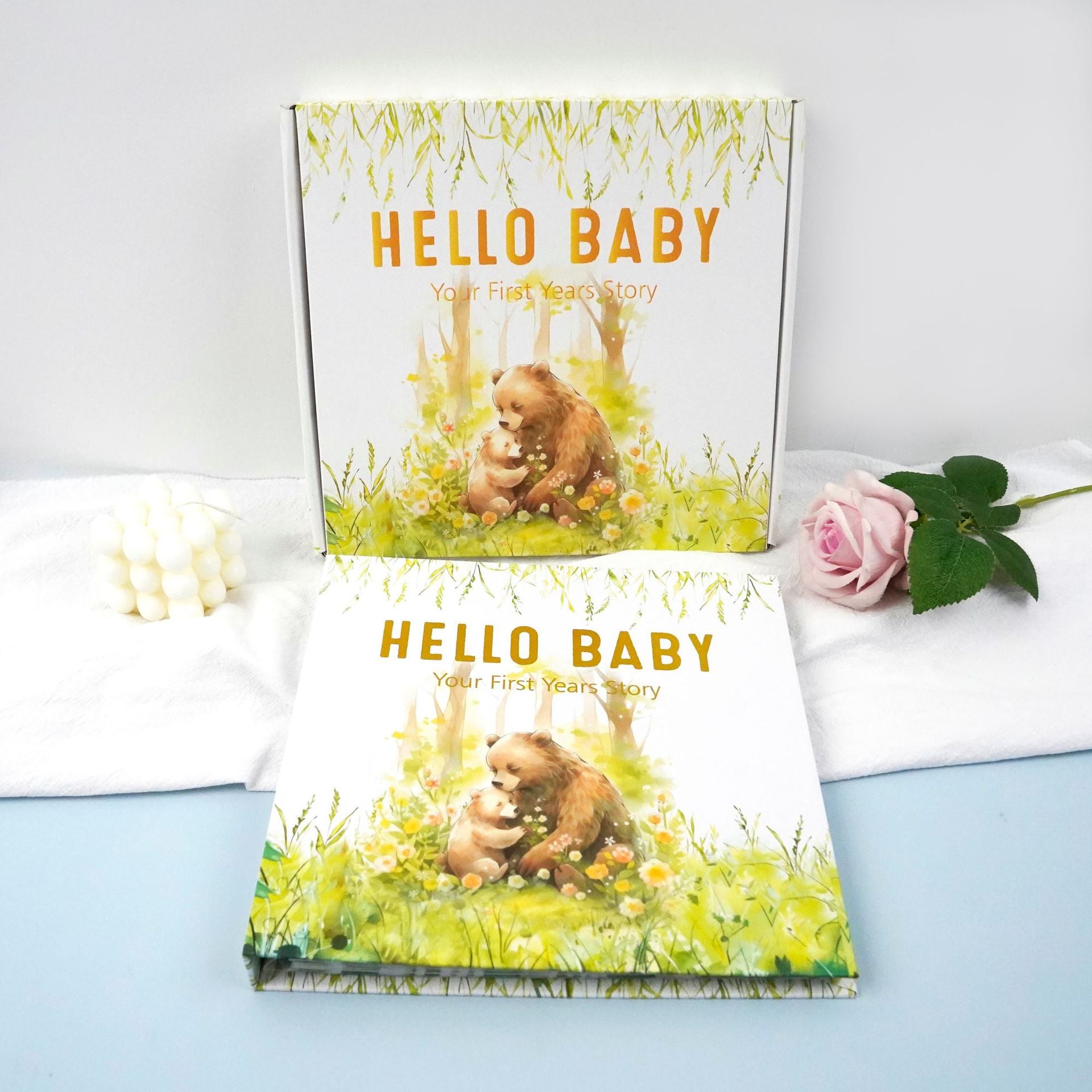 'Hello Baby' Your First Years Story, Mama Bear & Cub Edition on a light blue surface