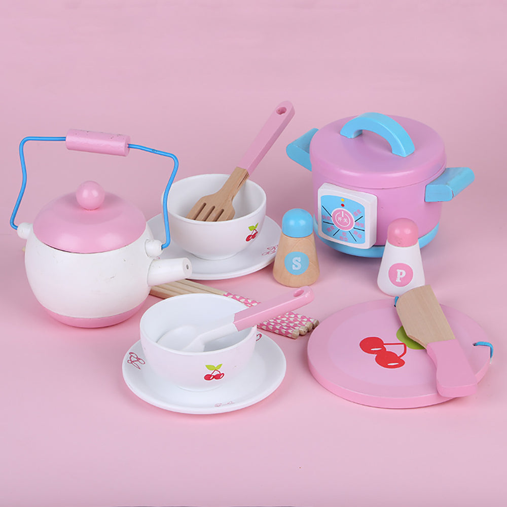 The Japanese Style Kitchen Utensils Play Set, including a pink Japanese-style teapot, rice cooker, bowls, utensils, and other kitchen accessories, all made of wood and plastic with a white and pink colour scheme.