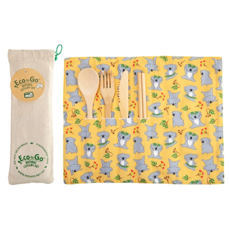 The Koala Eco-to-Go Bamboo Cutlery Set with playful koala's on a yellow placemat