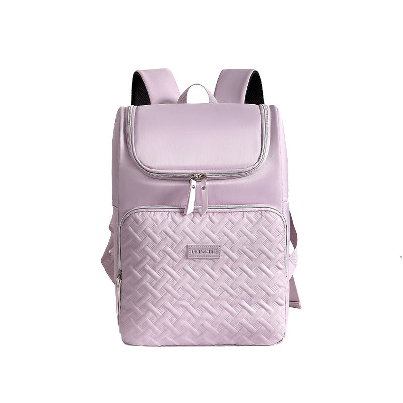 Lilac purple insulated backpack with a textured pattern on a white background