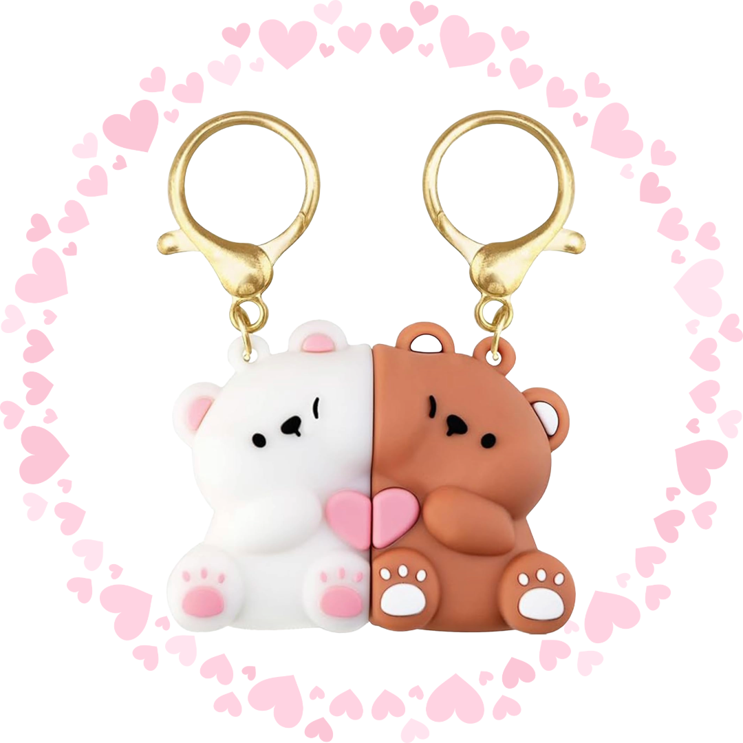The Magnetic Bear Couple Keychain Set – Cute Matching Love Heart Keyrings for Couples & Friends, featuring two bear-shaped keychains, one white and one brown, with pink hearts on a white background.