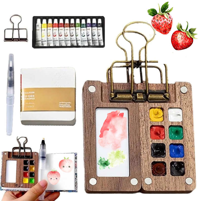 The Mini Watercolour Paint Set 8 Grid – Portable Pocket Travel Palette with Sketchbook & Brush, featuring watercolour paints, a brush, and a wooden palette on a white background.