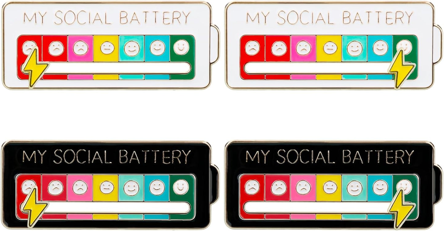 The Social Battery Mood Pin Set 4 Pack – Family Edition Adjustable Emotion Brooch Badges (2 Black & 2 White) featuring four colourful battery-themed pins with 'My Social Battery' text and smiley face indicators.