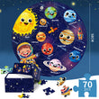 Children's 70 piece round Solar System Jigsaw Puzzle with cartoon planets and astronaut, displayed against a starry night sky.
