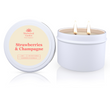 The Strawberries & Champagne Soy Candle Tin 165g, featuring a candle in a white tin labeled 'Strawberries & Champagne' by Sherwood Garden on a white background