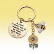 Sunflower Sister Keychain – Inspirational Gift for Best Friend, Sister or Loved One (Meaningful Keepsake), featuring an inspirational quote on a gold-tone disc with a bee and sunflower charm.