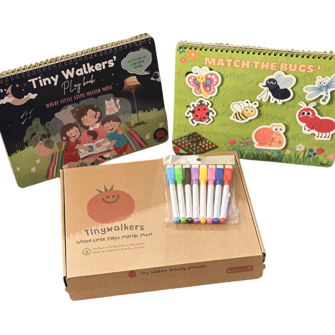 The Tiny Walkers Montessori Busy Book for Kids – 30 Page Interactive Learning Quiet Book with Activities & Accessories, featuring the playbook, durable cut-outs, and markers on a white background.