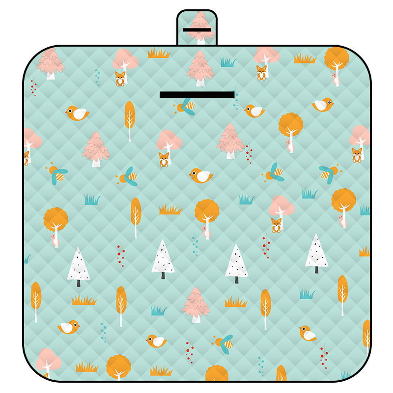 Woodland themed picnic blanket with a light blue green background